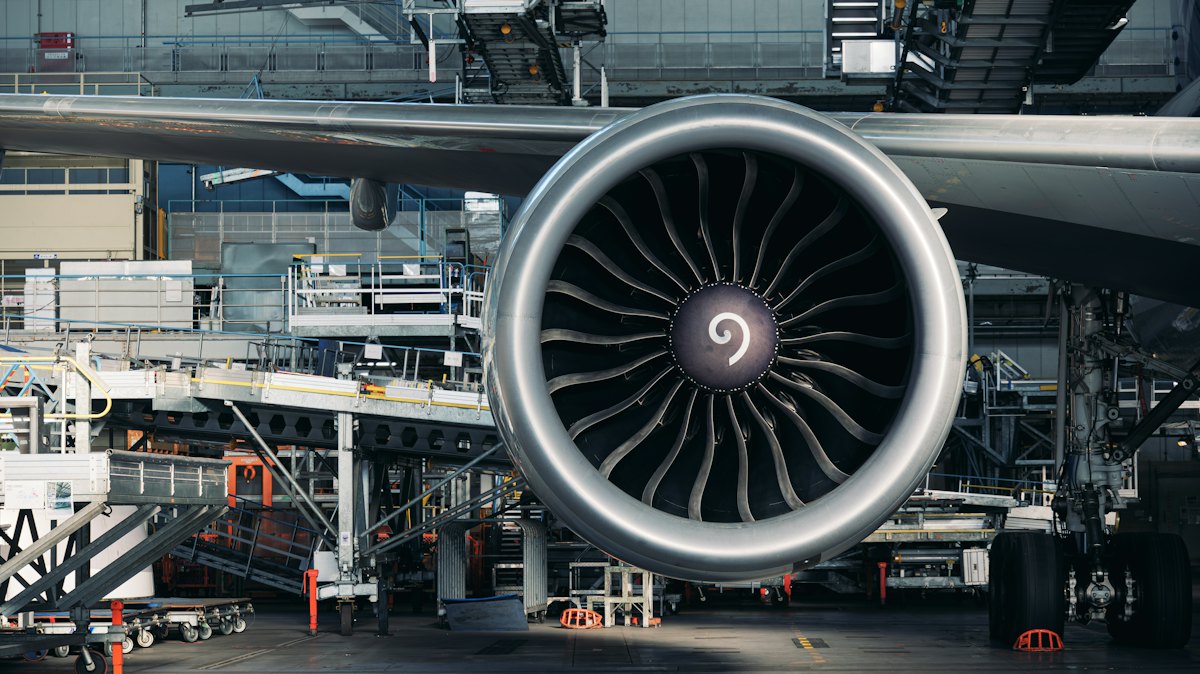 Jet engine under maintenance in a hangar